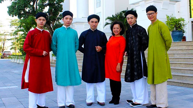 Vietnamese men wear Ao Dai as well