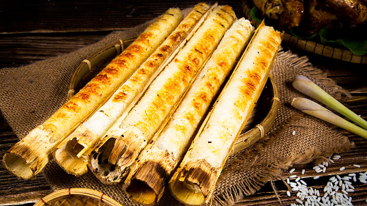 Fried rice in bamboo tubes