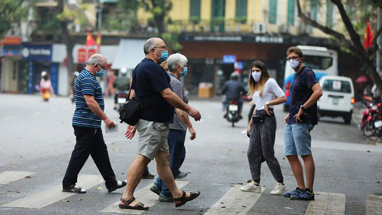 Tourists wearing masks